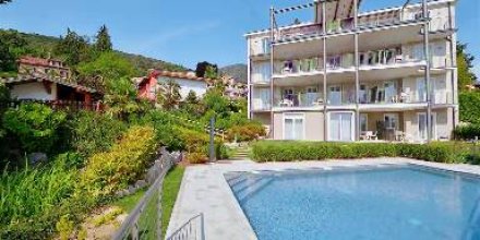 Wohnung mit Terrasse, Pool und Garten
