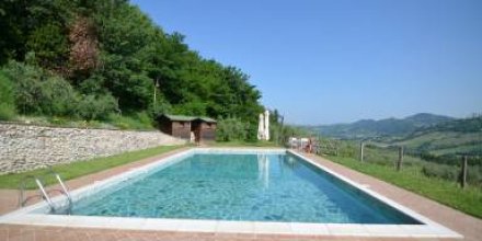 Ferienhaus mit Terrasse, Pool und Grill