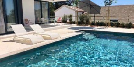 Ferienhaus mit Terrasse und Pool