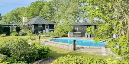 Familienorientiertes tolles Ferienhaus mit Terrasse, Sauna und Pool 