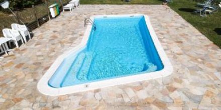 Ferienhaus mit Terrasse, Pool und Garten