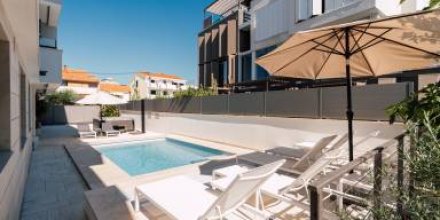 Ferienwohnung mit Terrasse, Garten und beheiztem Pool