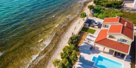 Luxuriöse Villa direkt am Meer - Agentur TA Leut